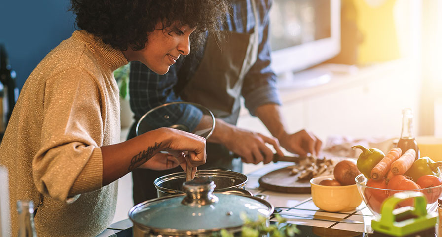 A couple cooking together